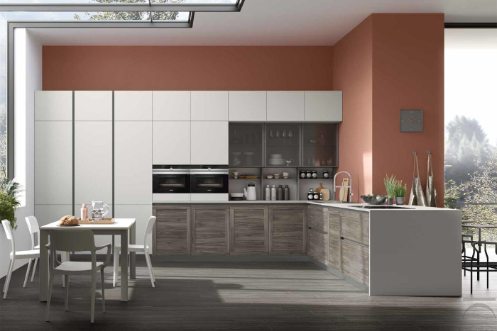 Cocina esquinera de diseño con una gran península para su uso en el mostrador