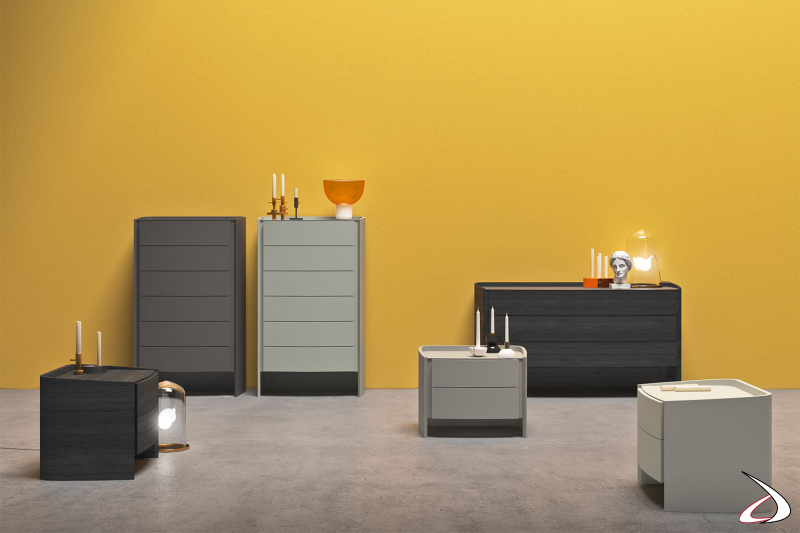 Modern bedroom design chest of drawers composed of nightstand, dresser and weekly table in wood or lacquered