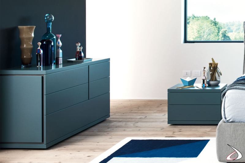 Matching matt lacquered bedside table and dresser, with thick top in contrasting front and side grooves