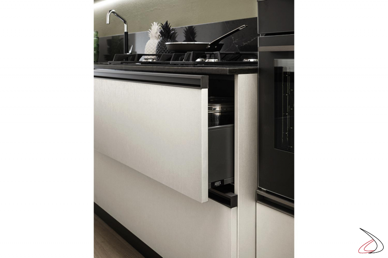 Linear designer kitchen with quartz worktop and distinctive rectangular handle