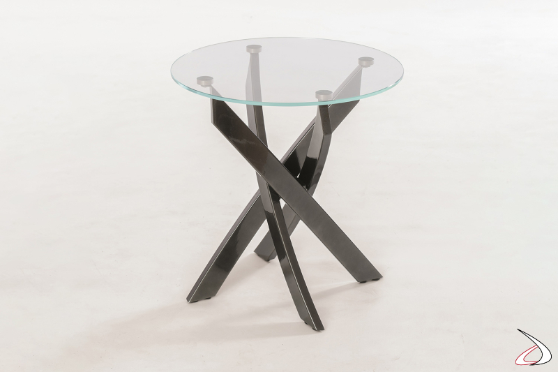 Tavolino rotondo alto di design con piano in cristallo trasparente e gambe intrecciate