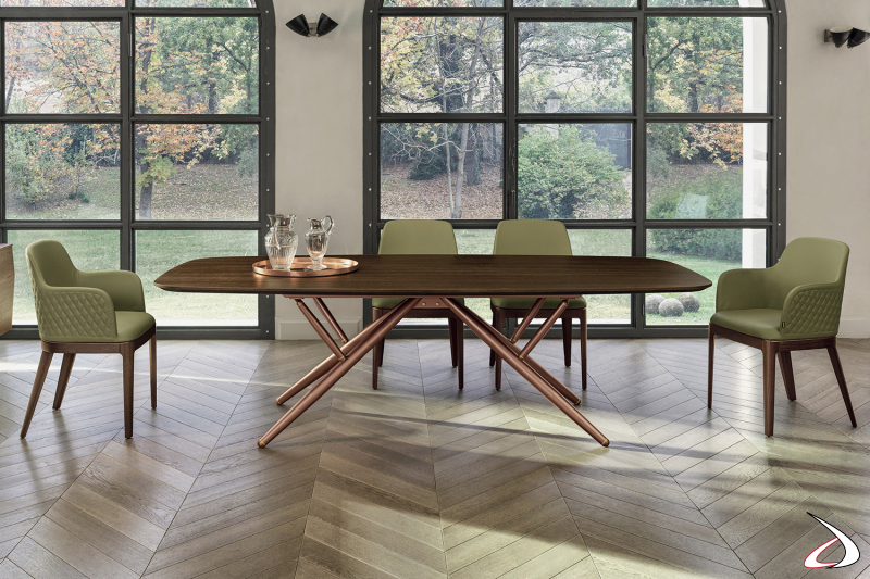 Tavolo elegante da soggiorno con piano a botte in legno impiallacciato e gambe centrali in oro rosa