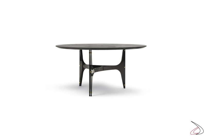 Tavolo rotondo di design in legno impiallacciato con basamento centrale ad archi in acciaio