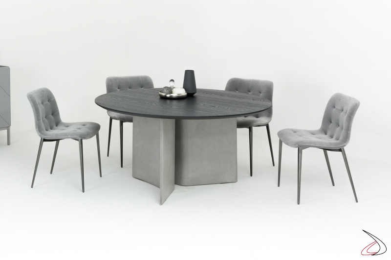 Tavolo moderno rotondo da soggiorno con basamento in cemento