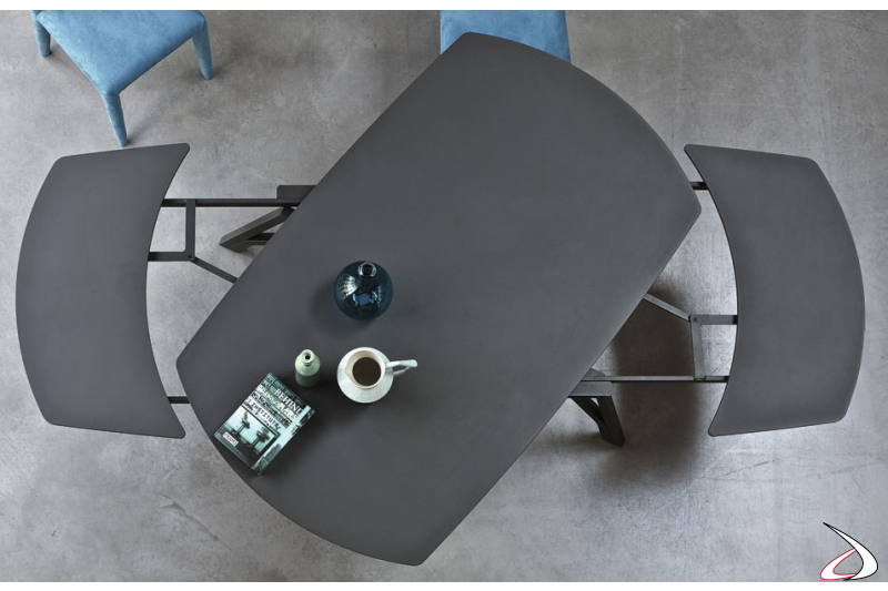 Extendable table with rotating surface