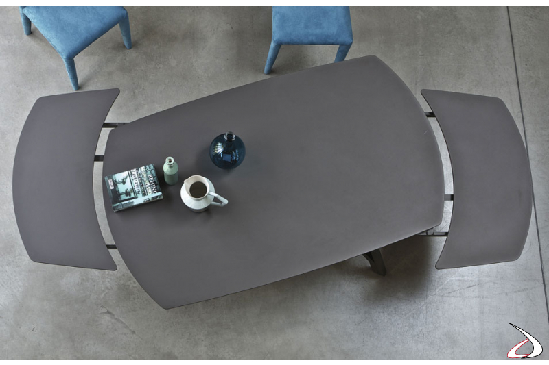 Tavolo moderno allungabile tramite piano girevole