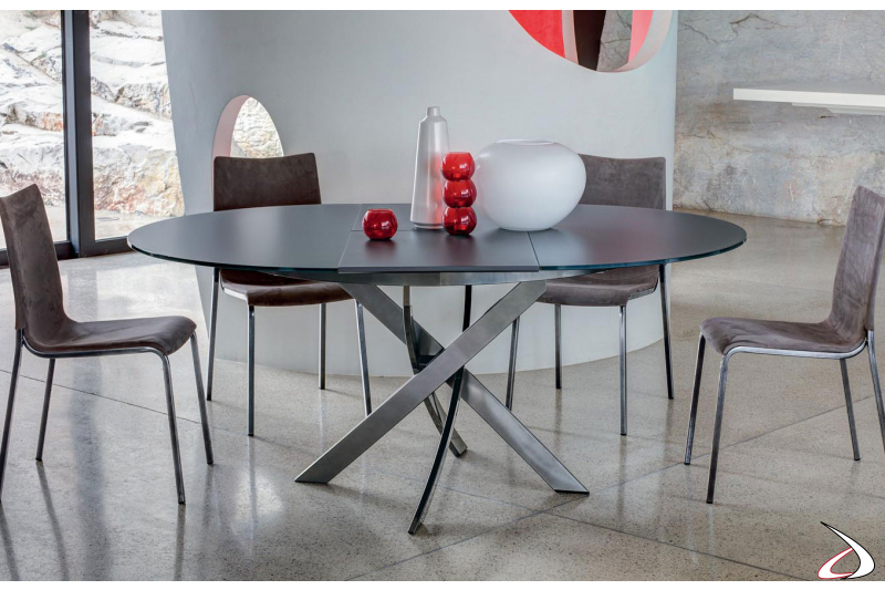 Extensible oval design table with scratch-resistant crystal top