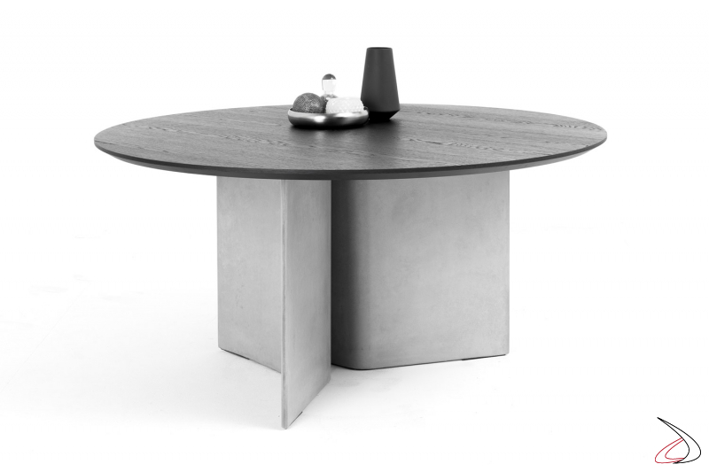 Tavolo rotondo di design con basamento in cemento e piano in legno impiallacciato