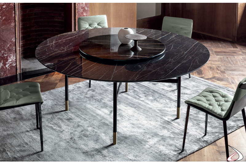 Tavolo rotondo di design con piano in marmo noir desir con piedini cilindrici