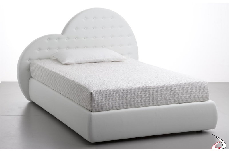 Design bed with padded heart shaped headboard