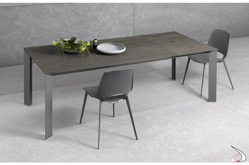 Tavolo moderno da soggiorno allungabile con piano in laminato cleaf rovere grafite
