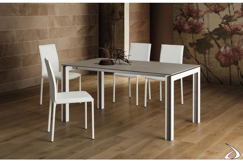 Tavolo di design per 10 persone da soggiorno con gambe in legno bianche con decorazione