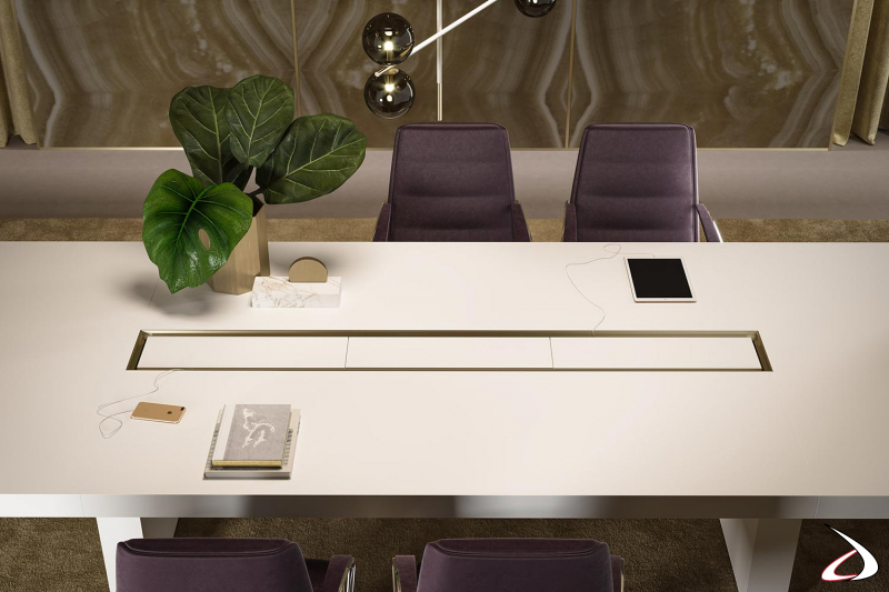Moderna mesa de reuniones blanca con canal de cable central