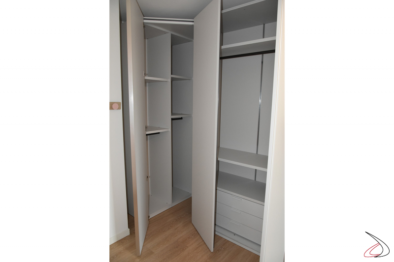 Corner wardrobe with walk-in wardrobe, desk and bookcase for girl's room