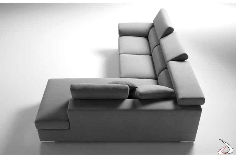 Upholstered sofa with corner peninsula and adjustable headrests