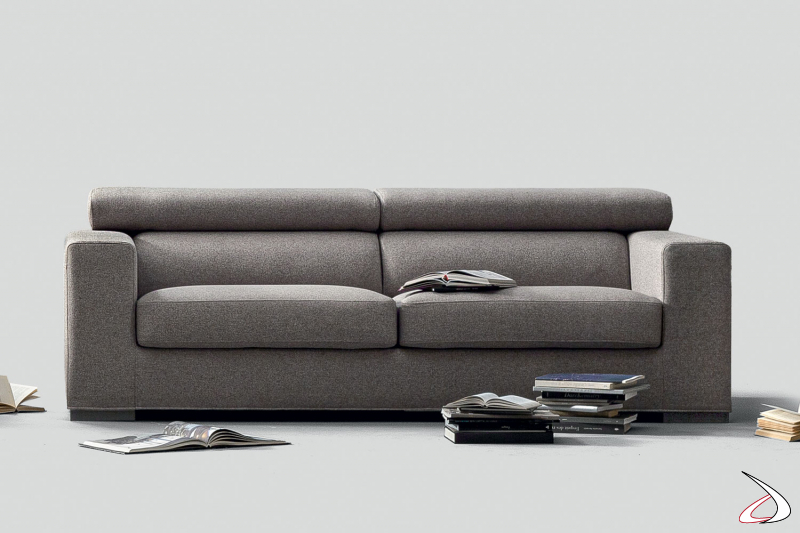 Modern sofa with low feet, reclining headrests and sliding seats