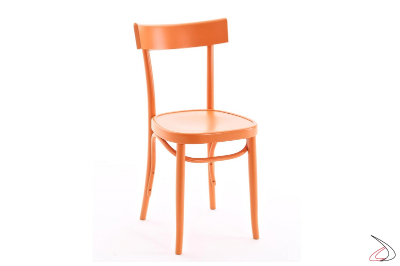 Sedia arancione in legno massello disegnata da We & Co. per Colico