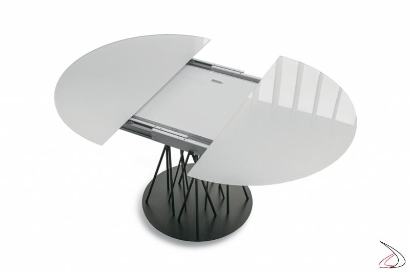 Modern extending round table with central folding extension leaf