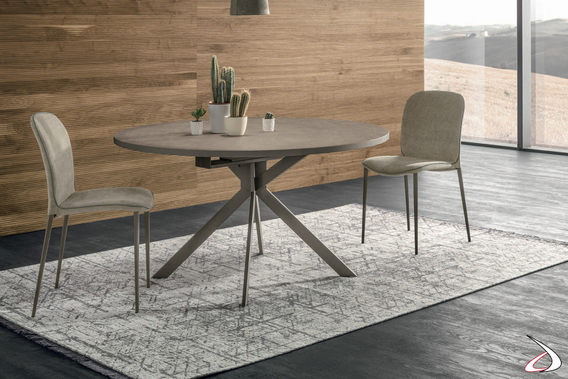 Tavolo rotondo moderno allungabile da salotto con 4 gambe centrali in metallo verniciato