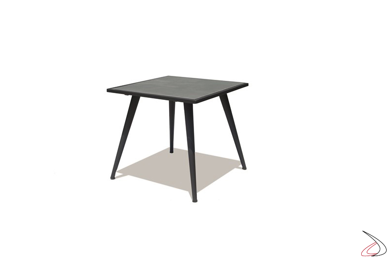 Tavolino piccolo Serpent gambe in alluminio verniciato e piano in ceramica stile Concrete.