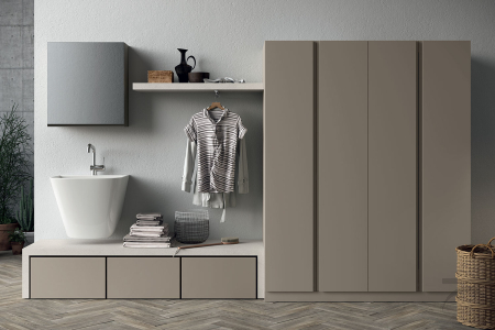 Lavanderia moderno con lavatoio sospeso, panca con cassetti porta biancheria