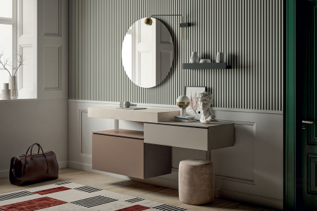 Arredo ingresso moderno con cassetti sospesi e specchiera rotonda
