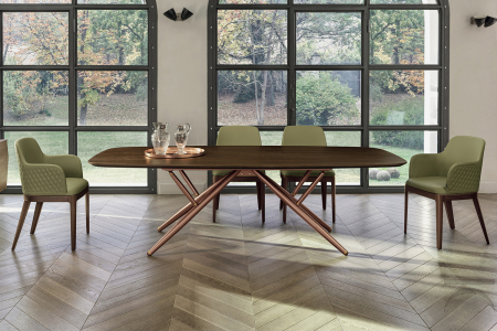 Tavolo elegante da soggiorno con piano a botte in legno impiallacciato e gambe centrali in oro rosa