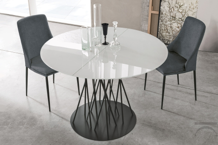 Mesa redonda extensible con base central y tablero de cristal blanco