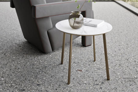 Modern small round coffee table with metal frame and laminate top