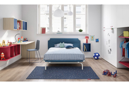 Dormitorio de diseño con escritorio en forma y estanterías cúbicas.