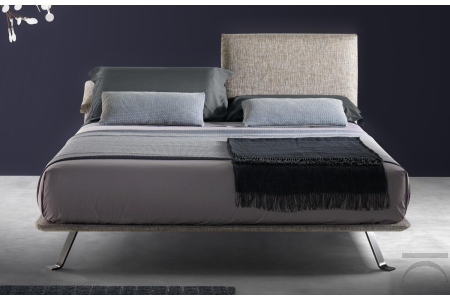 Design bed with folding headboard and high legs