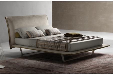 Upholstered double bed design with high legs
