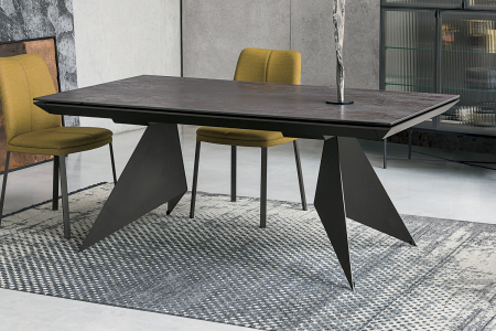 Tavolo allungabile di design da soggiorno con piano in ceramica e gambe a forma di vela
