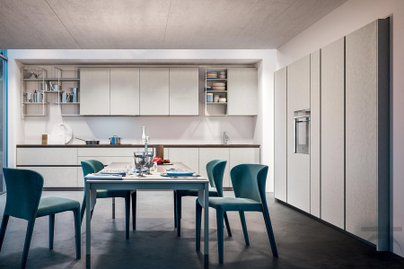 Economical modern kitchen with curved groove in cement effect melamine and stoneware top