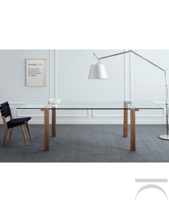 Tavolo moderno ed elegante con top in ceramica Noir Desir rettangolre e gambe in bronzo spazzolato. Allungabile con allunghi in vetro fumè.