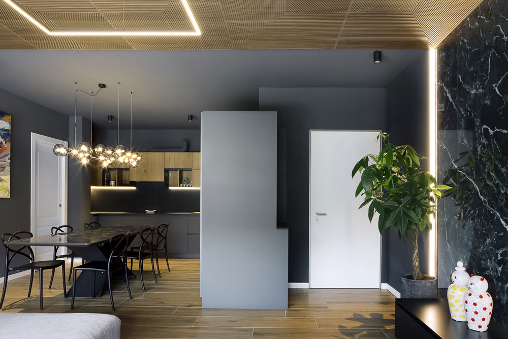 Apartment in Conegliano: open-plan kitchen and living room after refurbishment