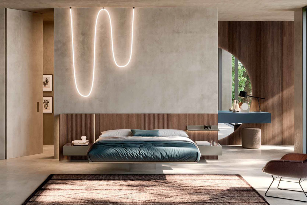 Cómo decorar un dormitorio con cama, armario y mesitas de noche distribuidos de forma equilibrada