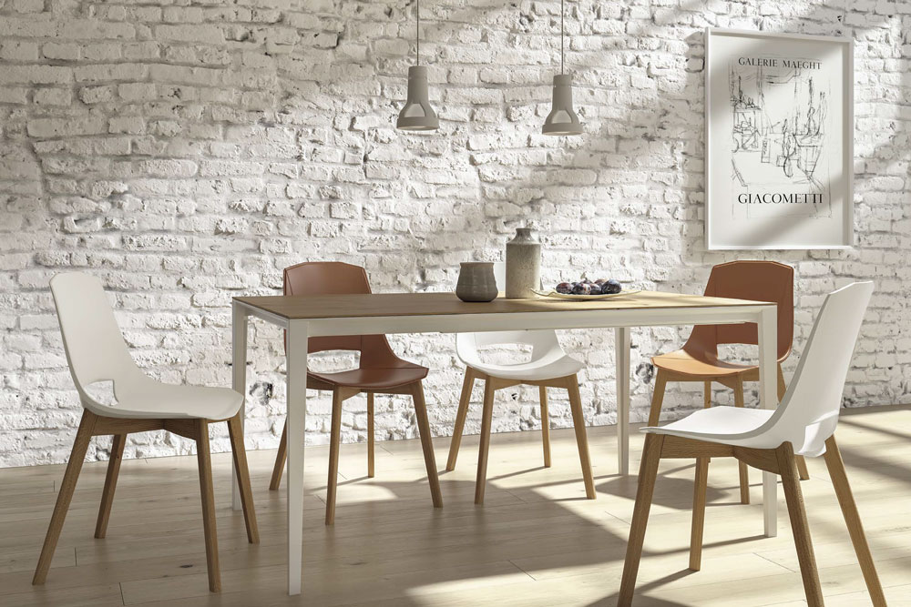 Mix and match dining chairs around the same table